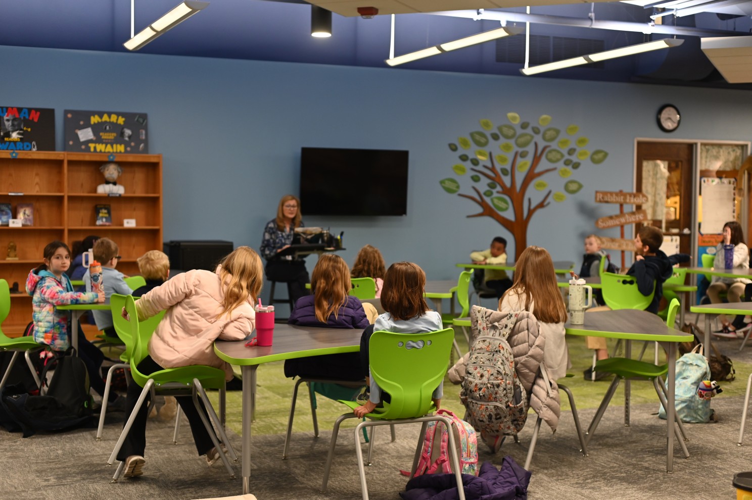 Lower School Director Cindy Hemme meets with student council in the media center.